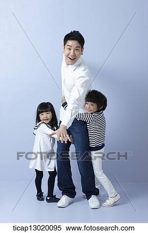 kids hugging their father View Large Photo Image Stock Photography - kids hugging their father. Fotosearch