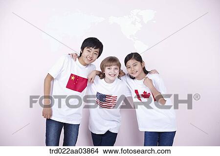 kids with Chinese, American and Canadian flags on their t-shirts View Large Photo Image Picture - kids with Chinese, American and Canadian flags on their t-shirts. Fotosearch