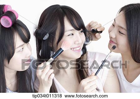 ladies posing with hair and beauty equipment View Large Photo Image Stock Photo - ladies posing with hair and beauty equipment. Fotosearch