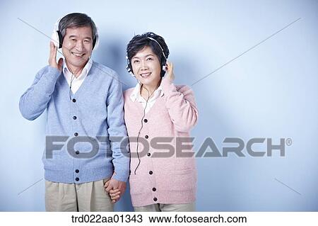 middle aged couple listening to music together View Large Photo Image Stock Image - middle aged couple listening to music together. Fotosearch