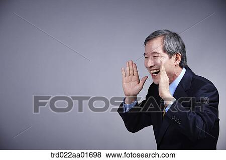 middle aged man in a business suit shouting View Large Photo Image Stock Photo - middle aged man in a business suit shouting . Fotosearch