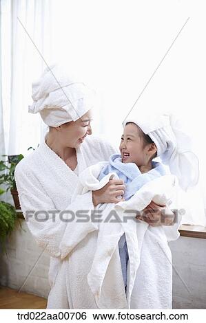 mother and daughter with bathrobe View Large Photo Image Stock Photograph - mother and daughter with bathrobe. Fotosearch