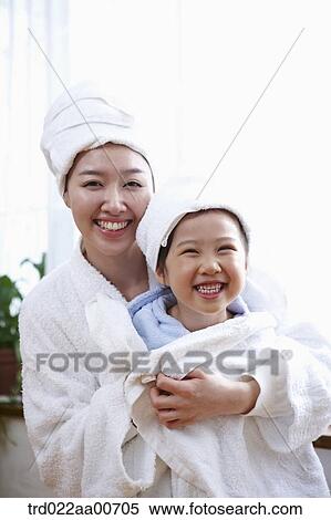 mother and daughter with bathrobe View Large Photo Image Stock Photography - mother and daughter with bathrobe. Fotosearch