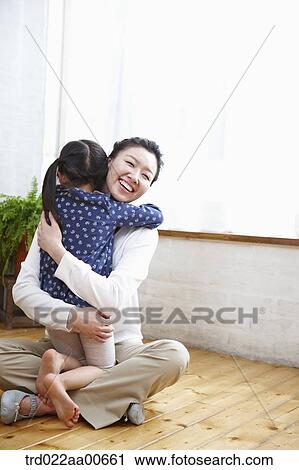mother hugging daughter View Large Photo Image Stock Image - mother hugging daughter. Fotosearch
