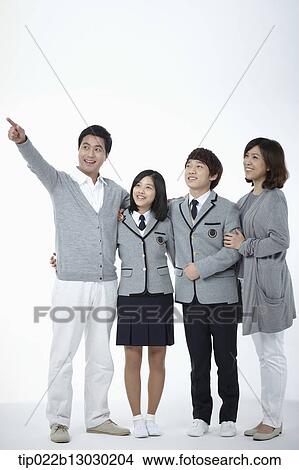 parents next to children with school uniforms View Large Photo Image Picture - parents next to children with school uniforms. Fotosearch