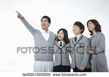 parents next to children with school uniforms View Large Photo Image Stock Photography - parents next to children with school uniforms. Fotosearch