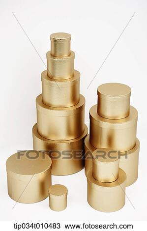 Stock Image - piles of golden boxes. Fotosearch