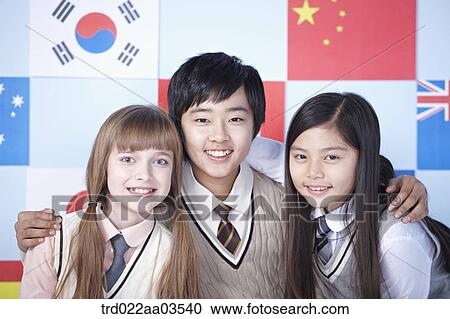 students in uniform posing in front of international flags View Large Photo Image Stock Image - students in uniform posing in front of international flags. Fotosearch