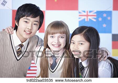 students in uniform posing in front of international flags View Large Photo Image Stock Photography - students in uniform posing in front of international flags. Fotosearch