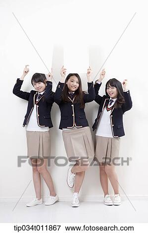 students in uniform posing with white boards View Large Photo Image Stock Photo - students in uniform posing with white boards . Fotosearch