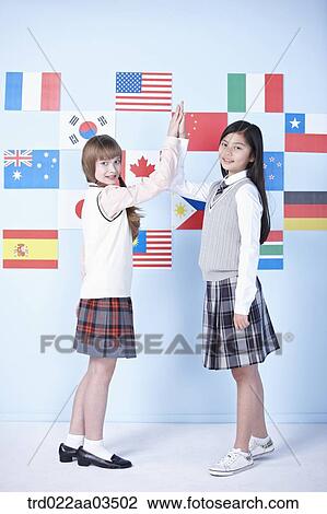 students in uniform standing in front of international flags View Large Photo Image Stock Image - students in uniform standing in front of international flags. Fotosearch