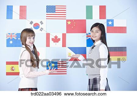 students in uniform standing in front of international flags View Large Photo Image Stock Photograph - students in uniform standing in front of international flags. Fotosearch