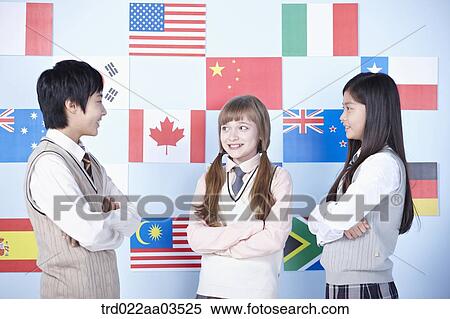 students in uniform standing in front of international flags View Large Photo Image Stock Photography - students in uniform standing in front of international flags. Fotosearch