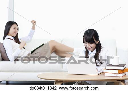students in uniform studying together in a room View Large Photo Image Stock Image - students in uniform studying together in a room. Fotosearch