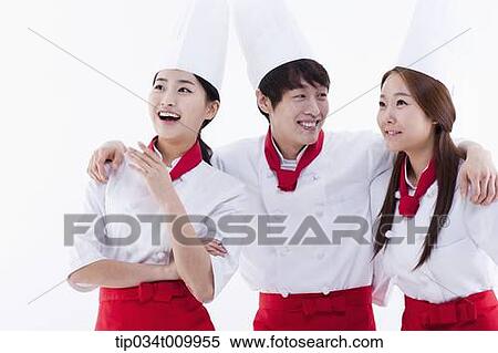 three cook with chef hats looking at same place View Large Photo Image Stock Photography - three cook with chef hats looking at same place. Fotosearch