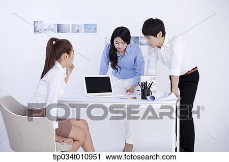three interior designers working on a project View Large Photo Image Stock Image - three interior designers working on a project. Fotosearch