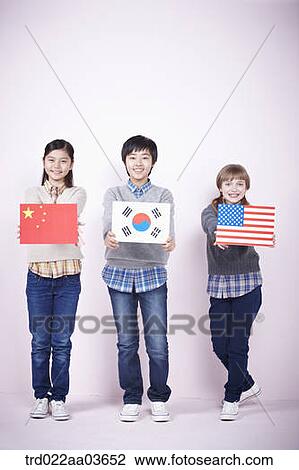 two girls and a boy each holding Chinese Korean and American flag View Large Photo Image Stock Image - two girls and a boy each holding Chinese Korean and American flag. Fotosearch