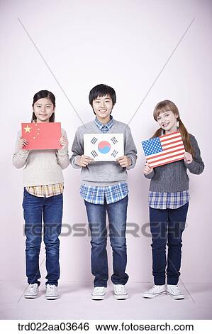 two girls and a boy each holding Chinese Korean and American flag View Large Photo Image Stock Photograph - two girls and a boy each holding Chinese Korean and American flag. Fotosearch