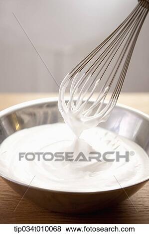 whip cream in a bowl View Large Photo Image Stock Photo - whip cream in a bowl. Fotosearch