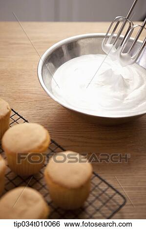 Stock Photograph - whip cream in a bowl. Fotosearch