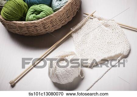 a basket of knit strings and knitting needle on the floor View Large Photo Image Stock Image - a basket of knit strings and knitting needle on the floor. Fotosearch