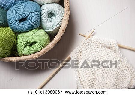 a basket of knit strings and knitting needle on the floor View Large Photo Image Stock Photo - a basket of knit strings and knitting needle on the floor. Fotosearch