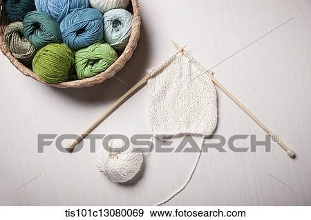 a basket of knit strings and knitting needle on the floor View Large Photo Image Stock Photo - a basket of knit strings and knitting needle on the floor. Fotosearch