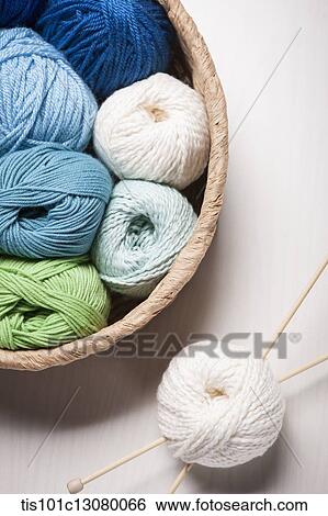 a basket of knit strings and knitting needle on the floor View Large Photo Image Stock Photograph - a basket of knit strings and knitting needle on the floor. Fotosearch