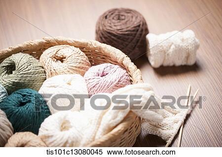 a basket of knit strings and knitting needle on wooden floor View Large Photo Image Stock Photography - a basket of knit strings and knitting needle on wooden floor. Fotosearch