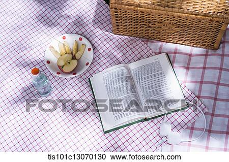 a book next to a picnic set View Large Photo Image Stock Image - a book next to a picnic set. Fotosearch