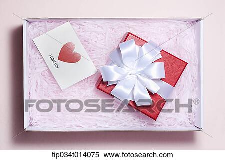 Stock Photography - a box with a letter and gift box. Fotosearch