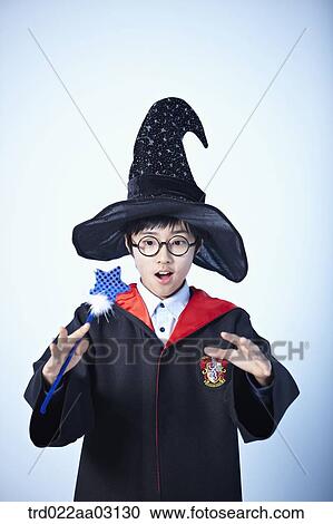 a boy dressed as a wizard View Large Photo Image Stock Image - a boy dressed as a wizard. Fotosearch