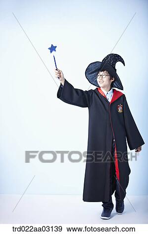a boy dressed as a wizard View Large Photo Image Stock Photo - a boy dressed as a wizard. Fotosearch