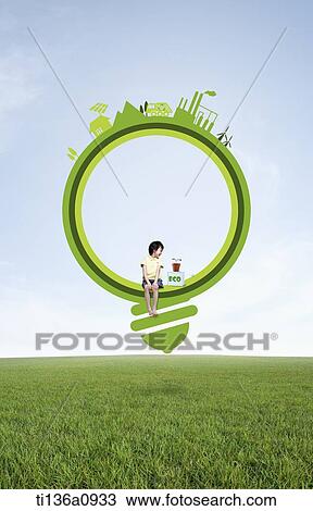 a boy sitting in an illustrated light bulb View Large Photo Image Stock Image - a boy sitting in an illustrated light bulb. Fotosearch