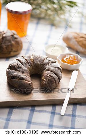 a bread next to a jam plate View Large Photo Image Stock Image - a bread next to a jam plate. Fotosearch