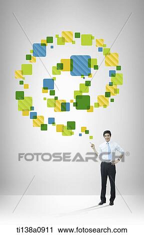 a business man next to an illustrated email sign View Large Photo Image Stock Image - a business man next to an illustrated email sign. Fotosearch