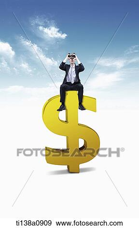 a business man sitting on a dollar sign View Large Photo Image Stock Photo - a business man sitting on a dollar sign. Fotosearch