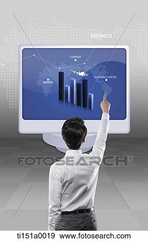 a businessman pointing at computer screen View Large Photo Image Stock Photo - a businessman pointing at computer screen. Fotosearch