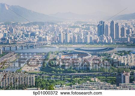 a city in front of mountains View Large Photo Image Stock Image - a city in front of mountains. Fotosearch