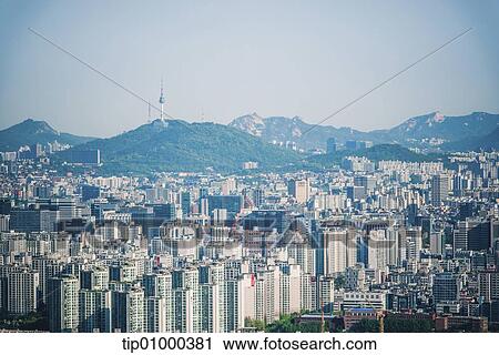 a city in front of mountains View Large Photo Image Stock Image - a city in front of mountains. Fotosearch