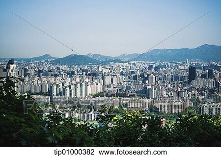 a city in front of mountains View Large Photo Image Stock Image - a city in front of mountains. Fotosearch