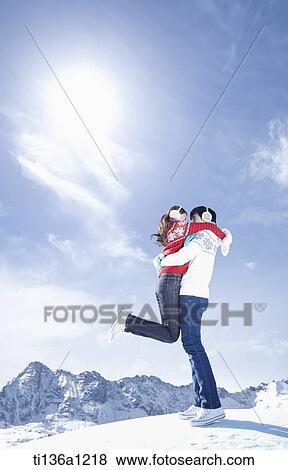 a couple in the mountain in winter View Large Photo Image Stock Photo - a couple in the mountain in winter. Fotosearch
