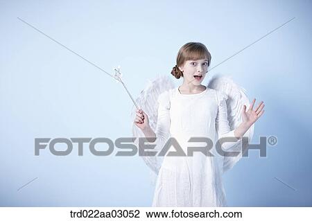 a girl dressed as an angel View Large Photo Image Stock Image - a girl dressed as an angel. Fotosearch