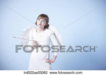 a girl dressed as an angel View Large Photo Image Stock Image - a girl dressed as an angel. Fotosearch