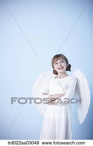 a girl dressed as an angel View Large Photo Image Stock Photo - a girl dressed as an angel. Fotosearch