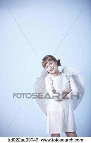 a girl dressed as an angel View Large Photo Image Stock Photo - a girl dressed as an angel. Fotosearch