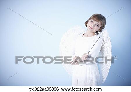 a girl dressed as an angel View Large Photo Image Stock Photograph - a girl dressed as an angel. Fotosearch