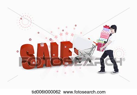 a girl holding pile of presents pushing shopping cart View Large Photo Image Stock Image - a girl holding pile of presents pushing shopping cart. Fotosearch