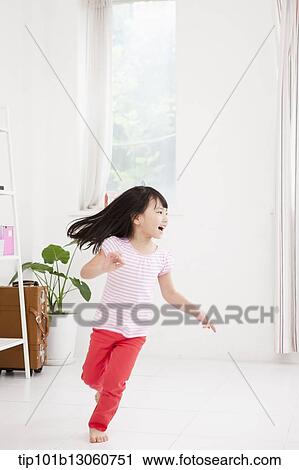 a girl running inside View Large Photo Image Stock Image - a girl running inside. Fotosearch