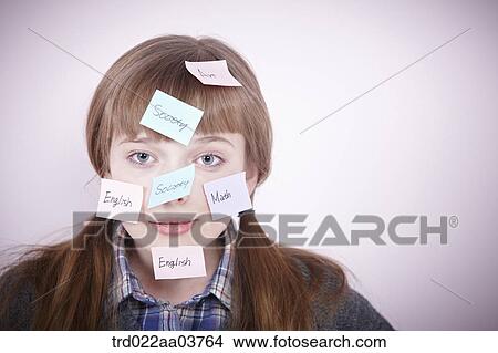 a girl with post-it notes all over her head View Large Photo Image Picture - a girl with post-it notes all over her head. Fotosearch
